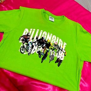 Neon green shirt with white writing and art for the background.